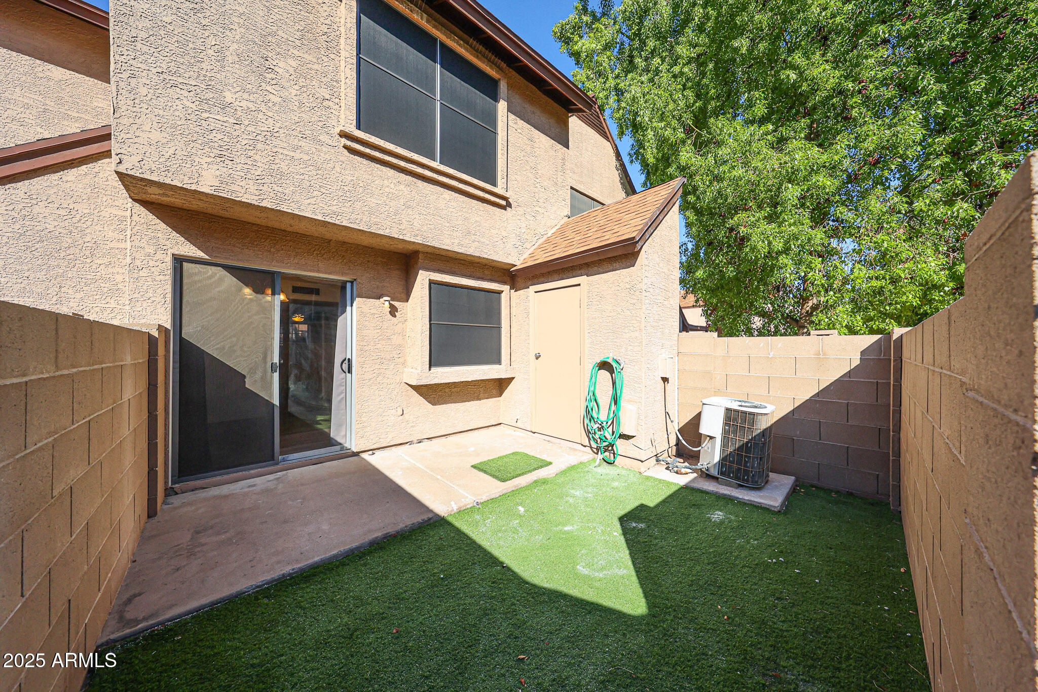 7977 West Wacker Road, Unit 245 Peoria, AZ 85381 - Photo 42 of 42 a view of back yard of the house