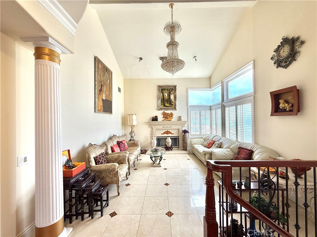 20128 Candleflame Court Walnut, CA 91789 - Photo 15 of 46 a living room with furniture and a flat screen tv