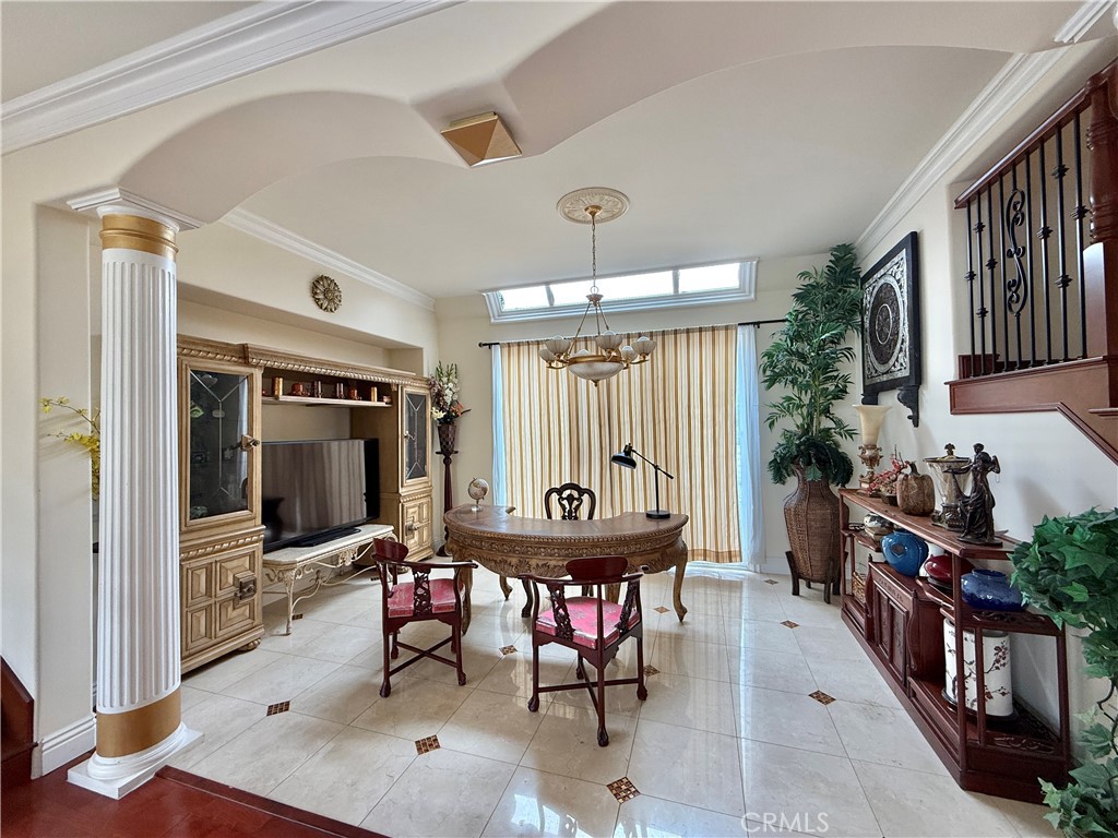 20128 Candleflame Court Walnut, CA 91789 - Photo 17 of 46 a dining room with furniture and a flat screen tv
