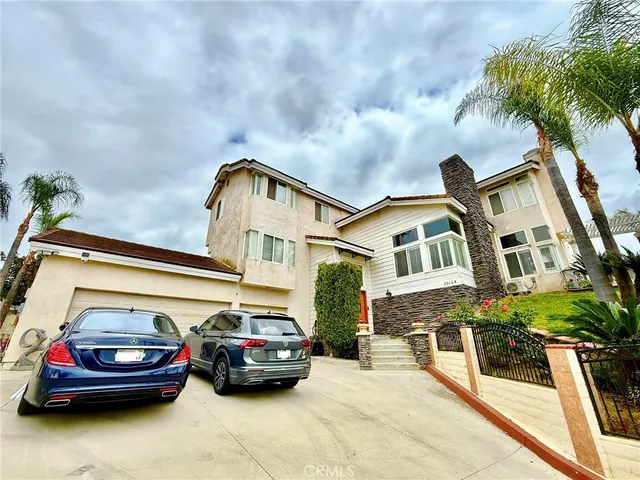 a car parked in front of a house