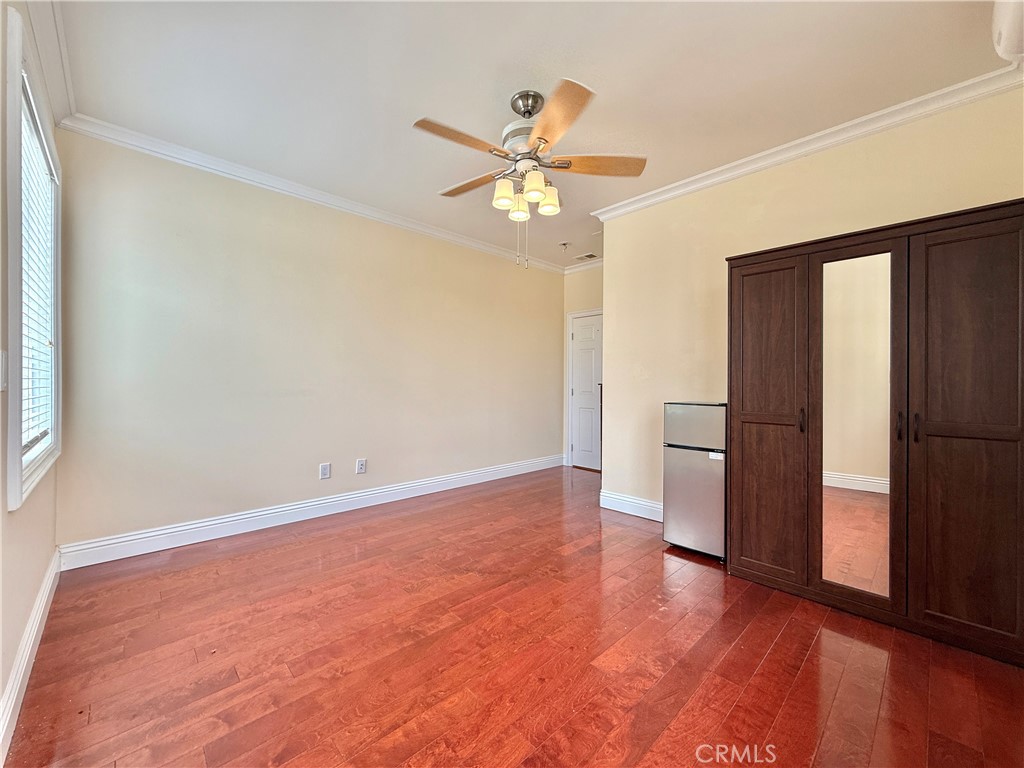 20128 Candleflame Court Walnut, CA 91789 - Photo 40 of 46 wooden floor in an empty room with a window