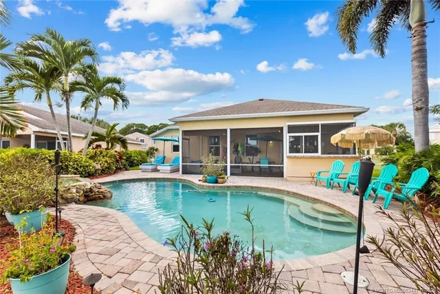 a view of a house with swimming pool