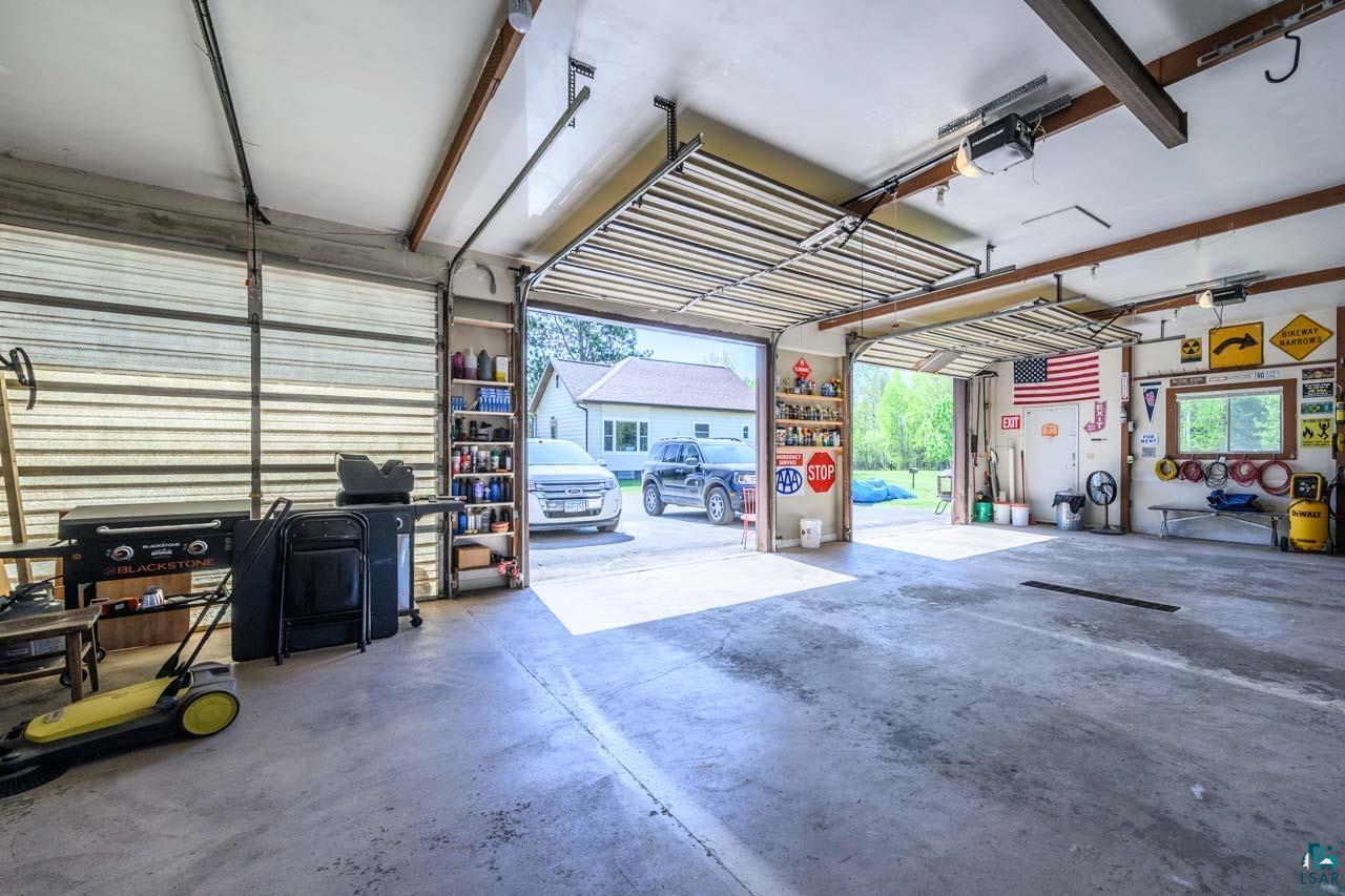 2581 O'Rourke Road Hibbing, MN 55746 - Photo 33 of 61 Two-car garage featuring concrete flooring and two overhead doors