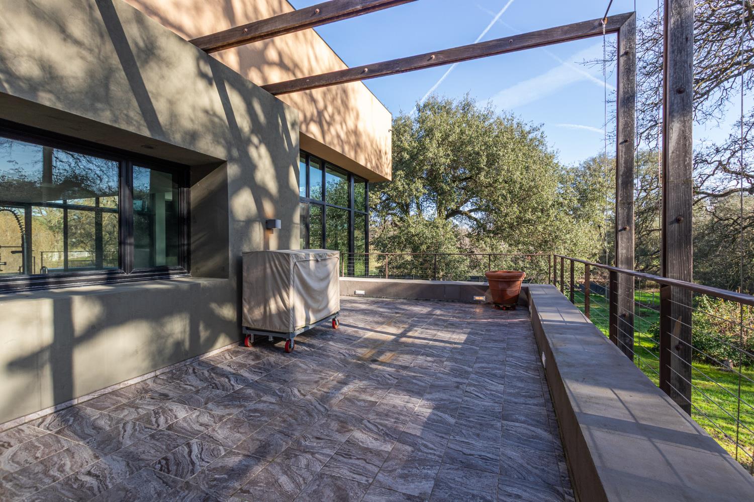 12100 Horseshoe Road Oakdale, CA 95361 - Photo 20 of 77 a view of a porch with a yard