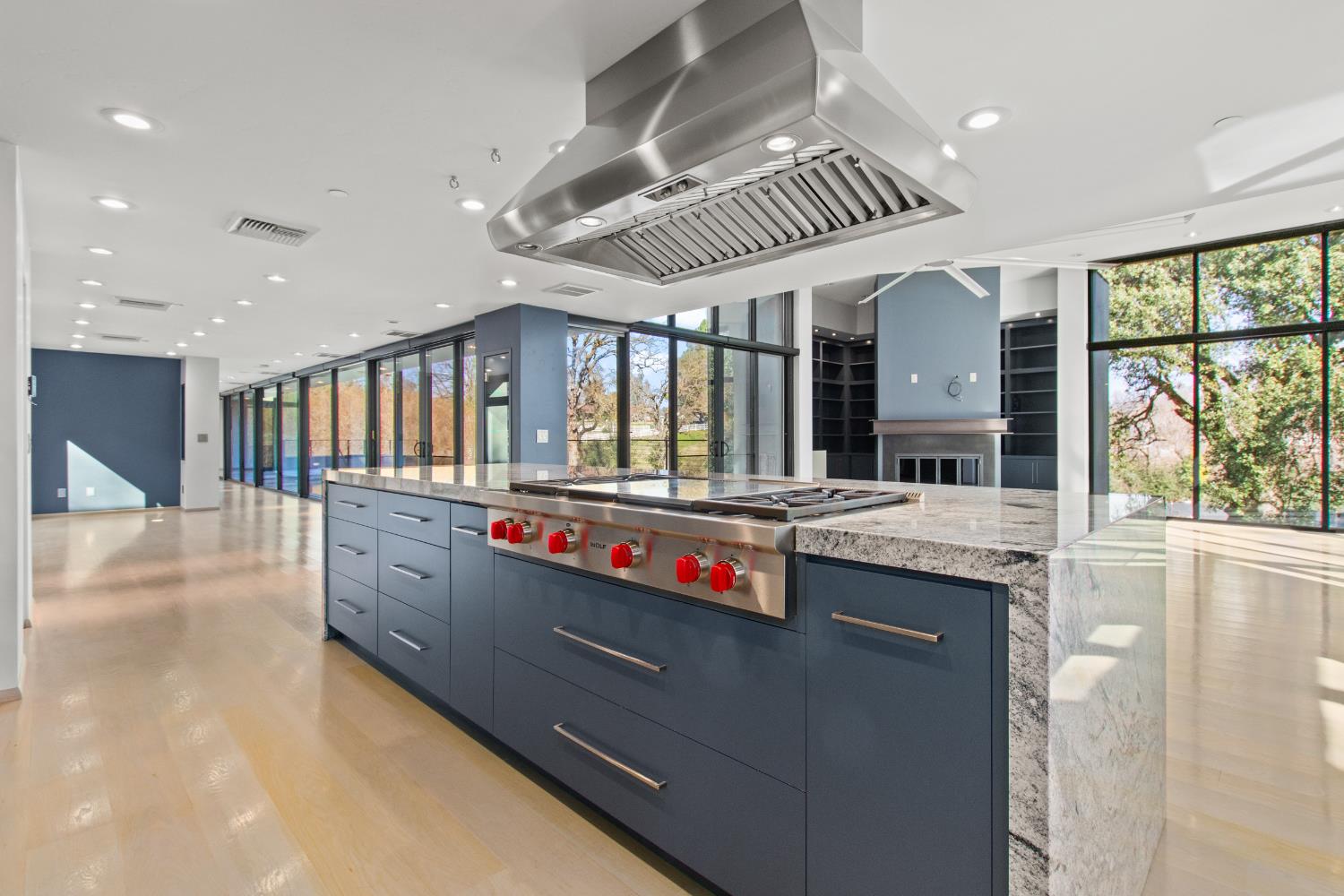 12100 Horseshoe Road Oakdale, CA 95361 - Photo 25 of 77 a kitchen with stainless steel appliances granite countertop a large stove a sink and a refrigerator