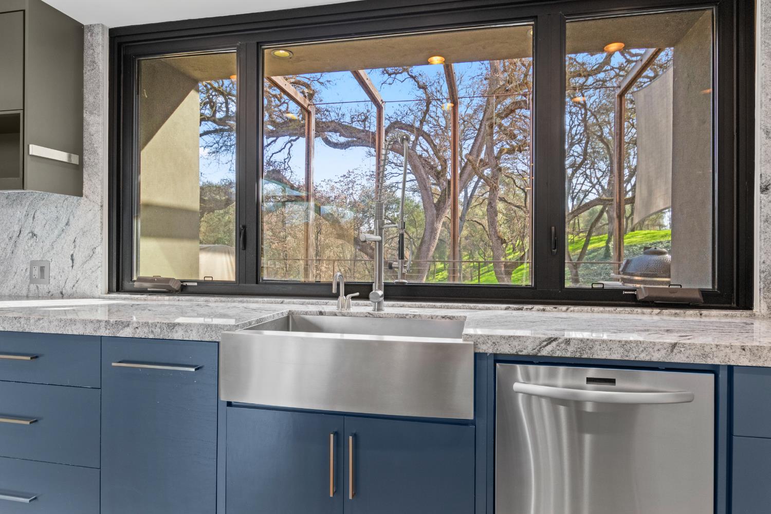 12100 Horseshoe Road Oakdale, CA 95361 - Photo 27 of 77 a sink with a granite countertop window and a sink
