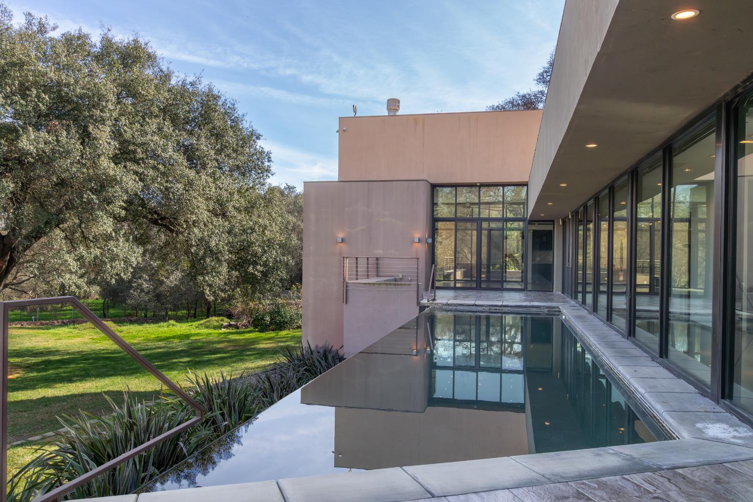 12100 Horseshoe Road Oakdale, CA 95361 - Photo 36 of 77 a front view of a house with a yard