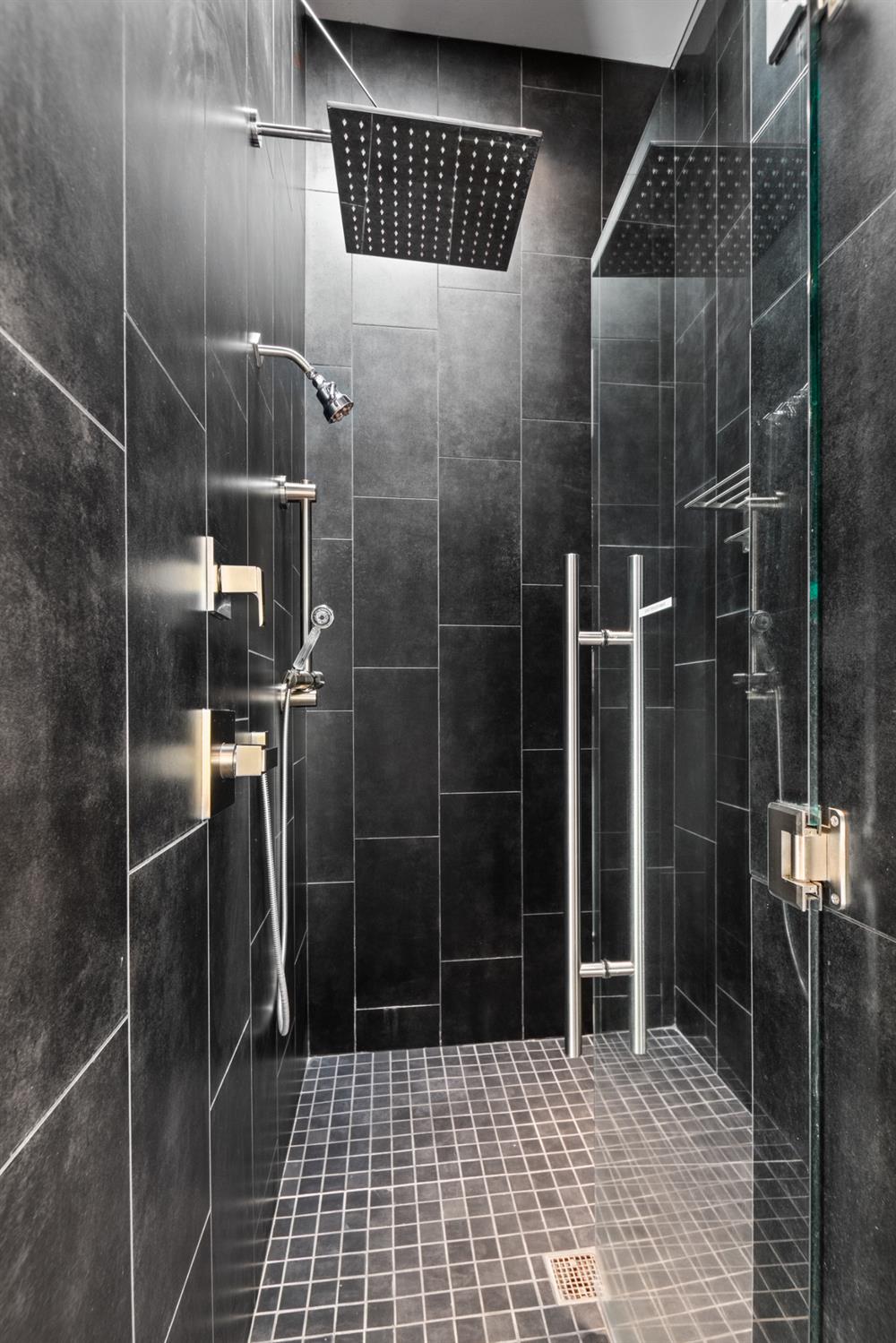 12100 Horseshoe Road Oakdale, CA 95361 - Photo 43 of 77 a bathroom with a glass door shower