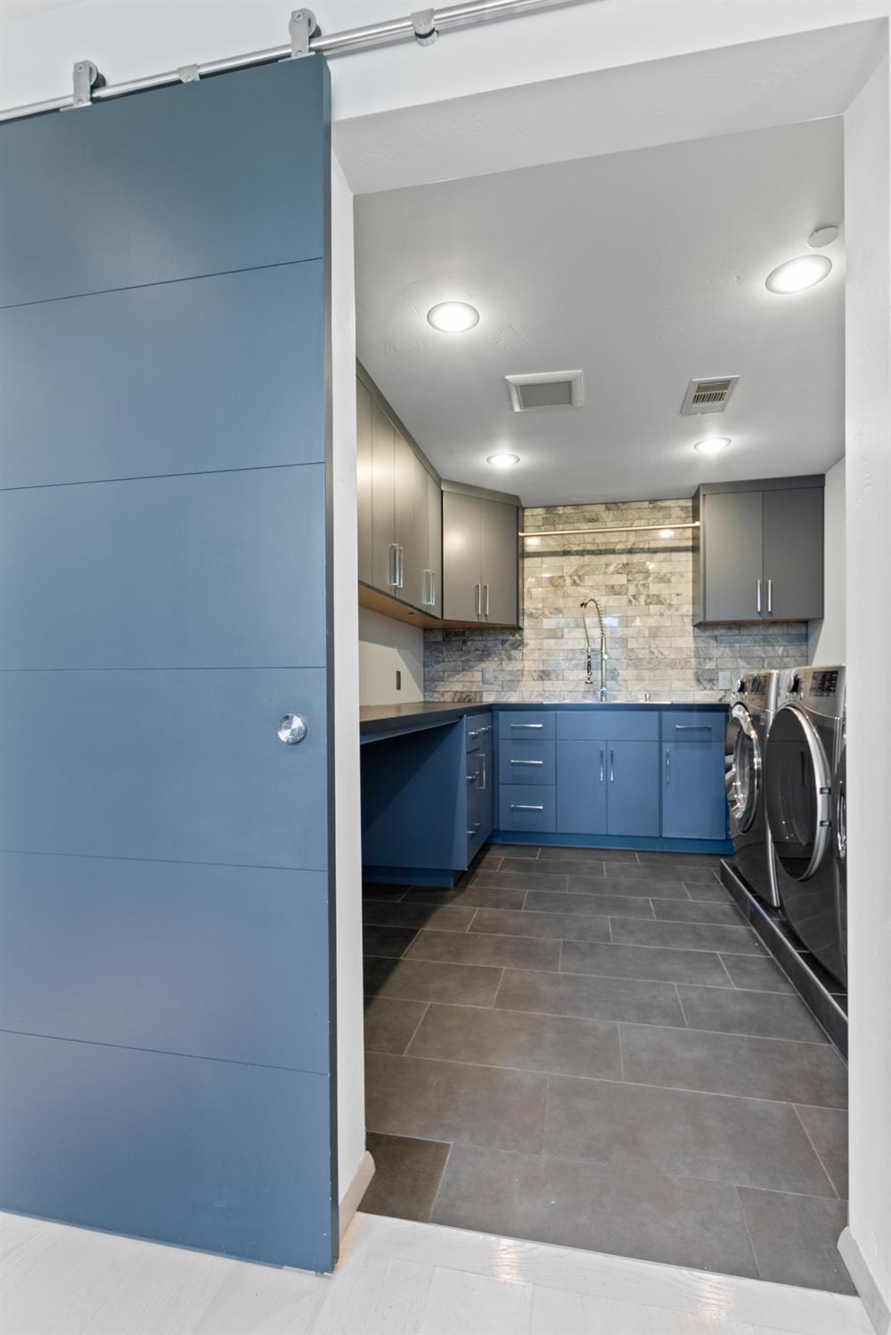 12100 Horseshoe Road Oakdale, CA 95361 - Photo 45 of 77 a view of a kitchen with a sink and cabinets