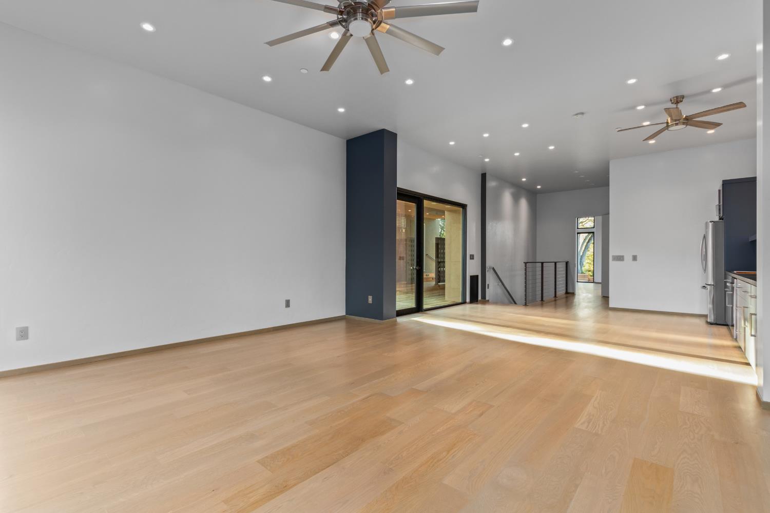 12100 Horseshoe Road Oakdale, CA 95361 - Photo 55 of 77 an empty room with fan and windows