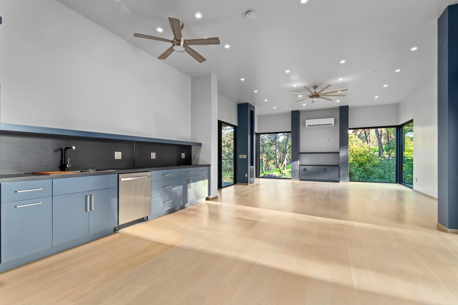 12100 Horseshoe Road Oakdale, CA 95361 - Photo 59 of 77 a large white kitchen with a large window