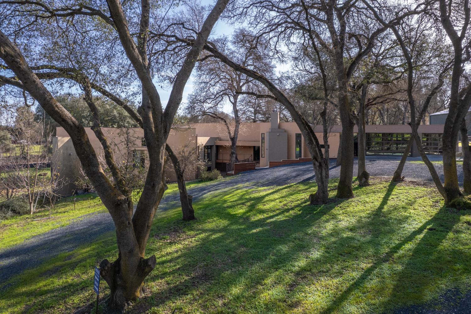 12100 Horseshoe Road Oakdale, CA 95361 - Photo 7 of 77 a view of a yard with large trees