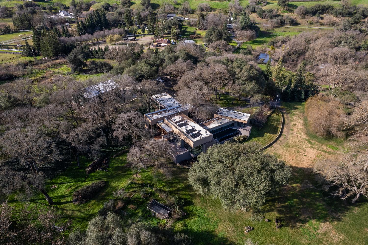 12100 Horseshoe Road Oakdale, CA 95361 - Photo 73 of 77 an aerial view of house with outdoor space
