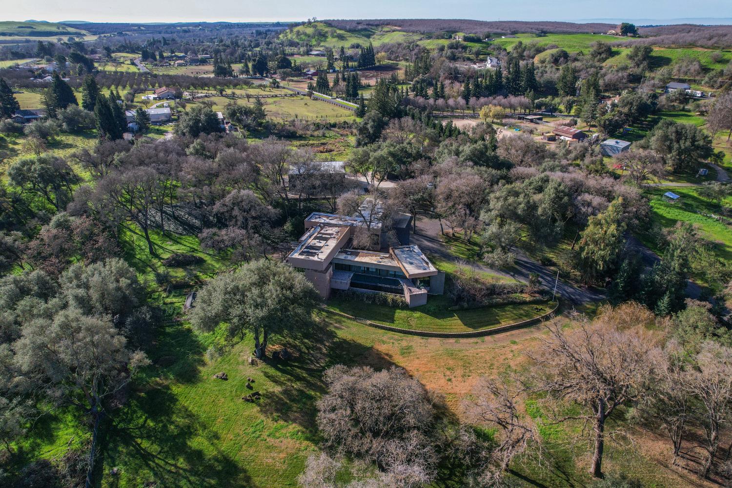 12100 Horseshoe Road Oakdale, CA 95361 - Photo 74 of 77 an aerial view of a house with a yard and lake view