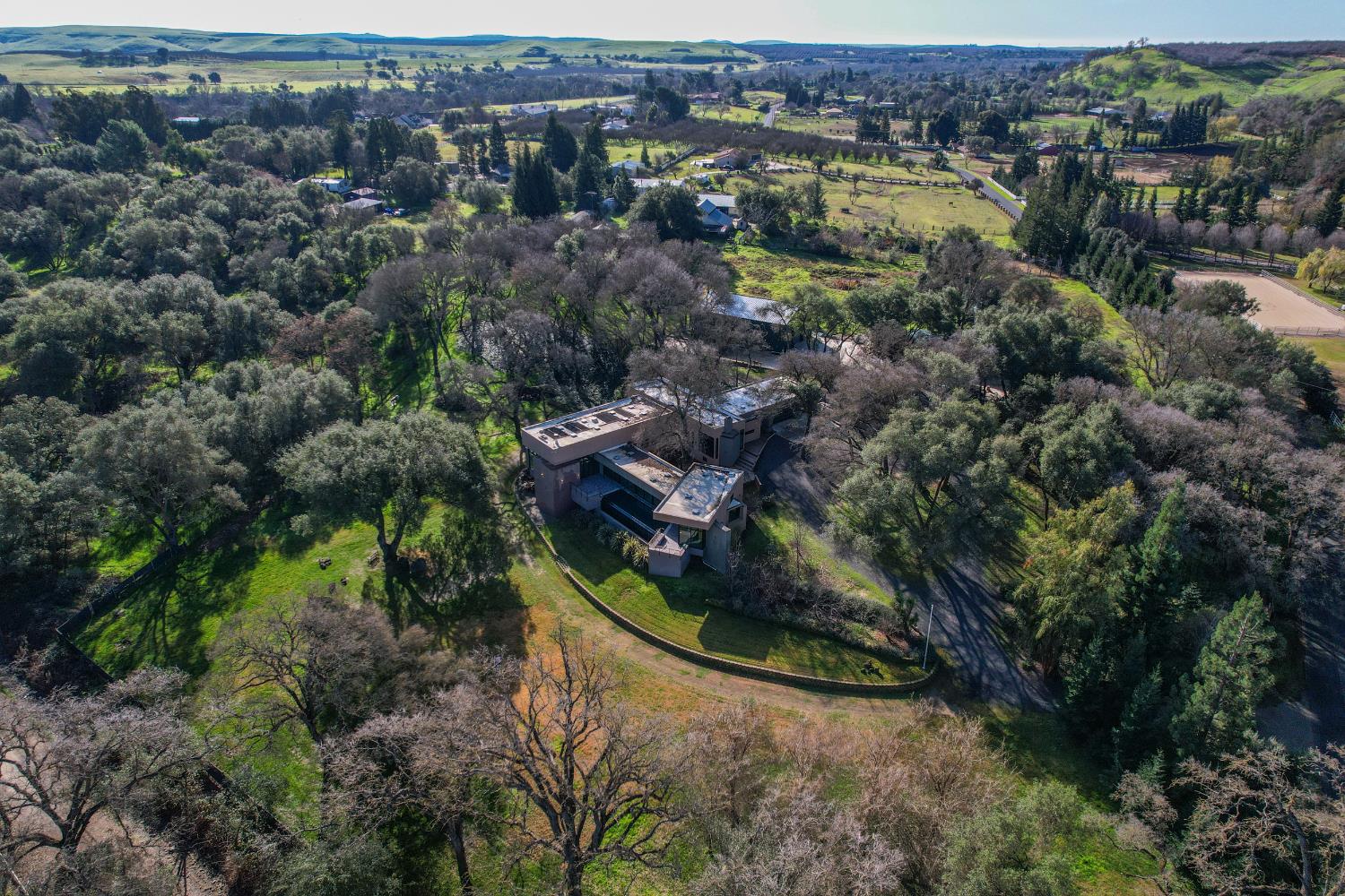 12100 Horseshoe Road Oakdale, CA 95361 - Photo 75 of 77 an aerial view of residential house with outdoor space and trees all around