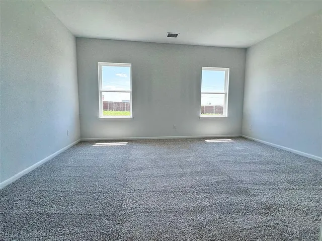 a bathroom with a bathtub and a sink
