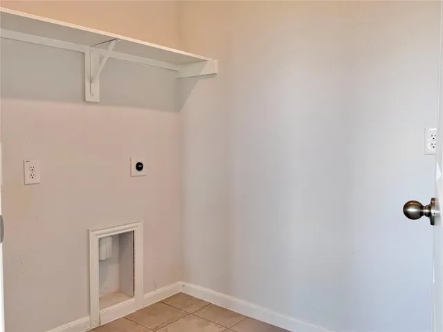 a view of a kitchen with wooden floor