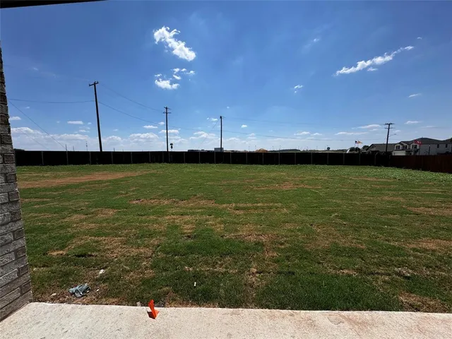 a view of a lake with a big yard