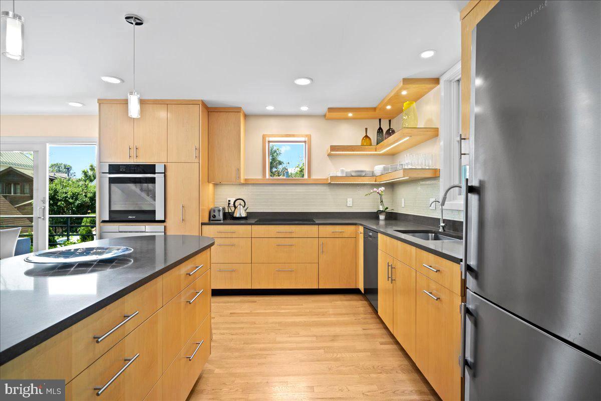 60 Humbert Street Princeton, NJ 08542 - Photo 20 of 44 a large kitchen with stainless steel appliances granite countertop a sink and cabinets