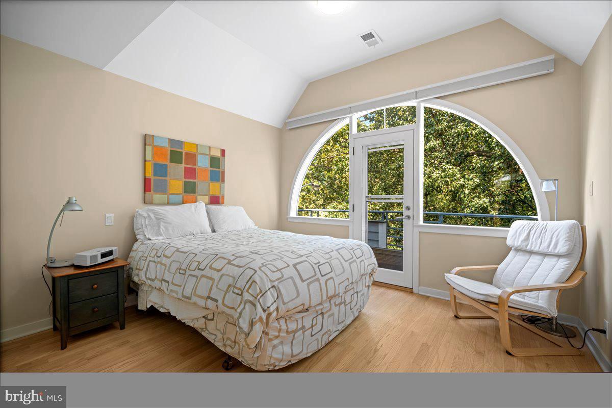 60 Humbert Street Princeton, NJ 08542 - Photo 26 of 44 a bedroom with a bed and a chair