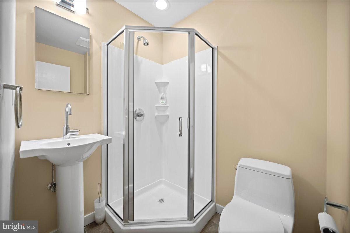 60 Humbert Street Princeton, NJ 08542 - Photo 33 of 44 a bathroom with a shower a toilet and sink