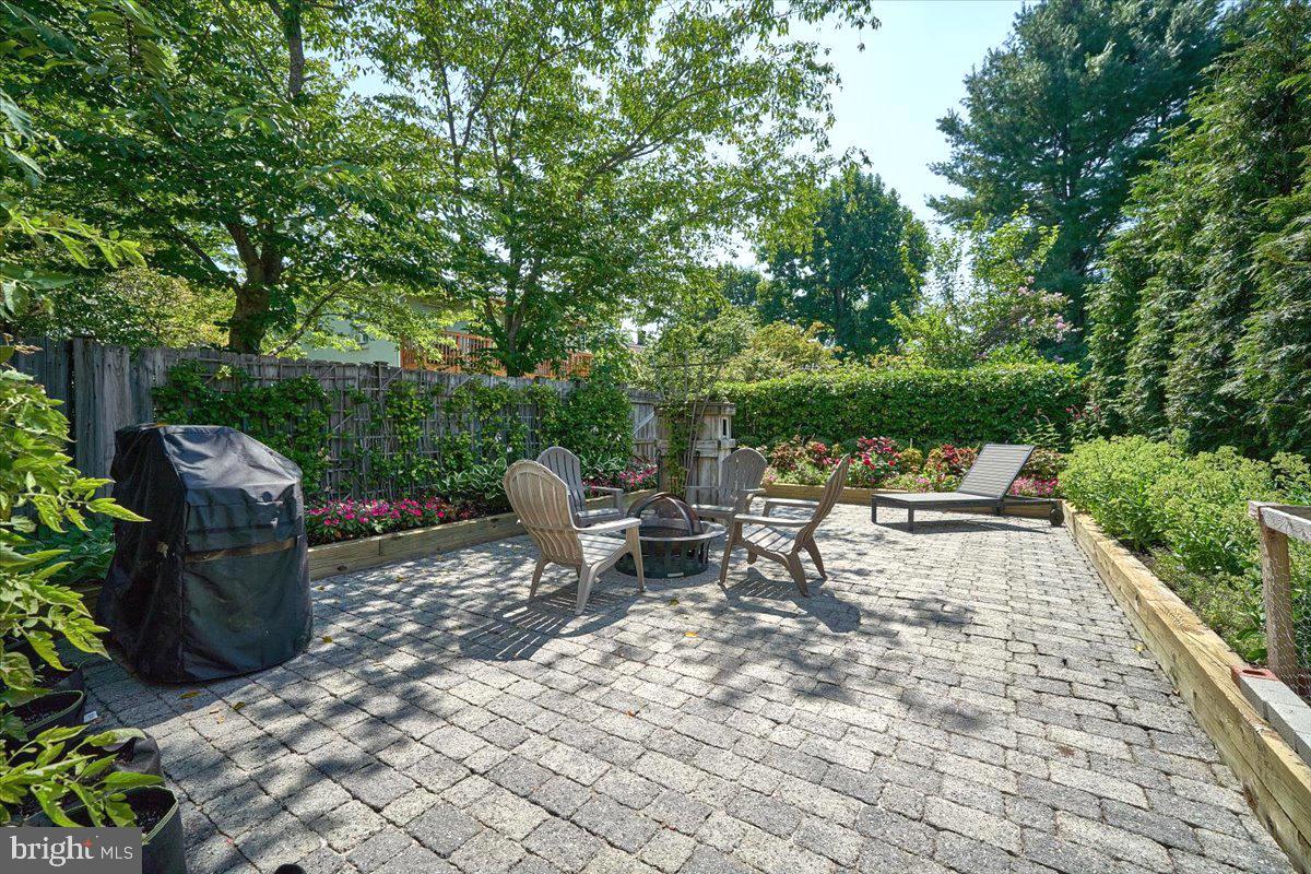 60 Humbert Street Princeton, NJ 08542 - Photo 40 of 44 a view of a patio with table and chairs potted plants and large tree