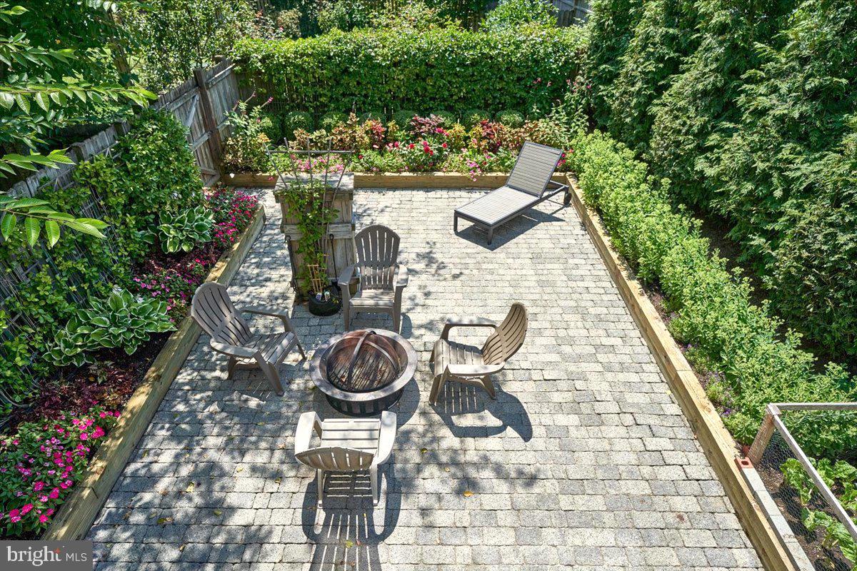 60 Humbert Street Princeton, NJ 08542 - Photo 43 of 44 a backyard of a house with lots of green space and fountain