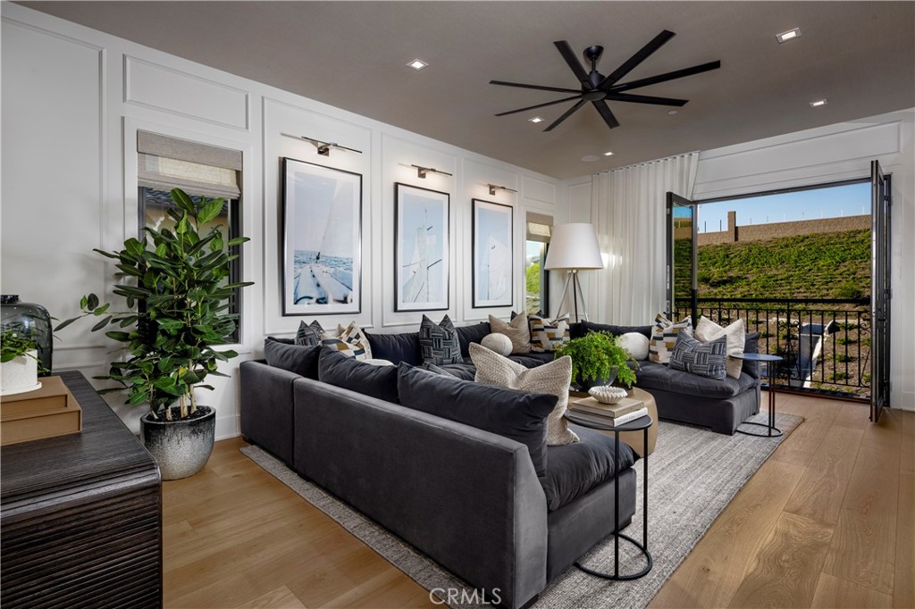 560 Peninsula Irvine, CA 92602 - Photo 15 of 20 a living room with furniture potted plant with a flat screen tv