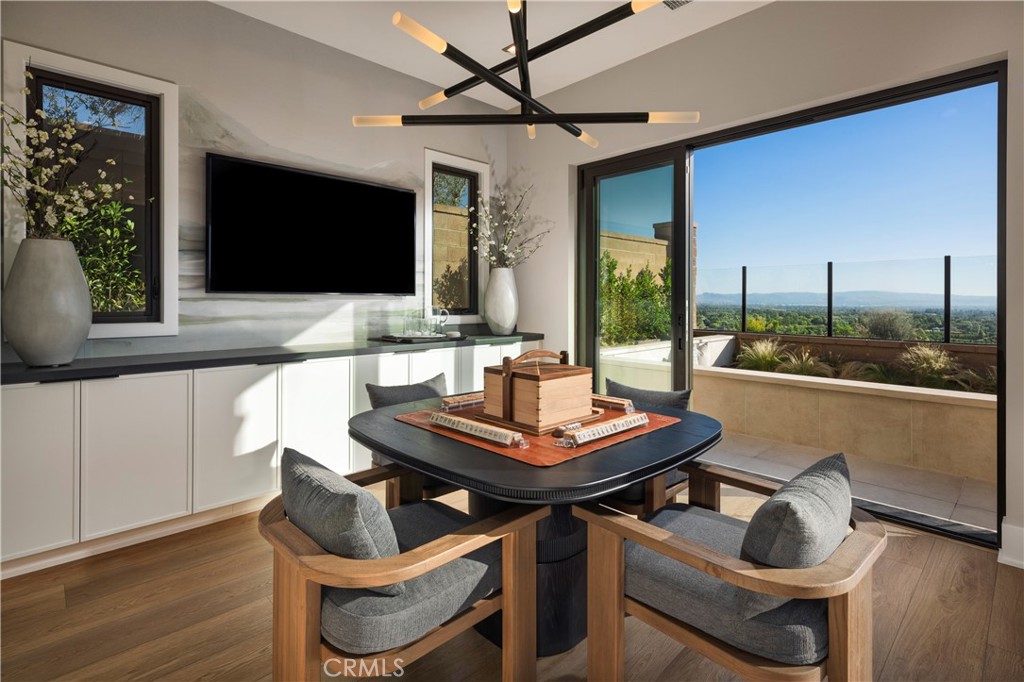 560 Peninsula Irvine, CA 92602 - Photo 17 of 20 a living room with furniture and a flat screen tv