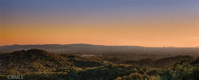 a view of a house with a mountain