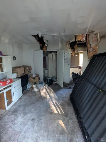 a room with furniture and a window