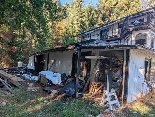 a view of a house with a patio
