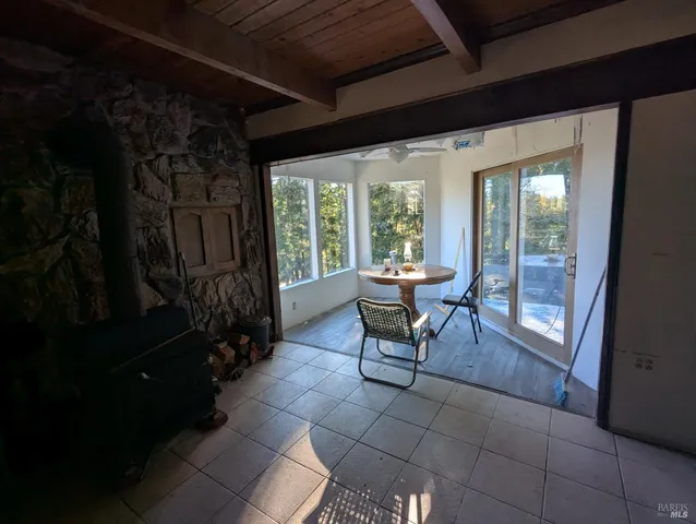 a view of a room with wooden walls