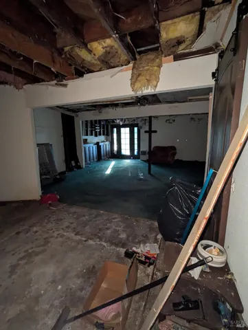 a bathroom with a sink mirror and vanity