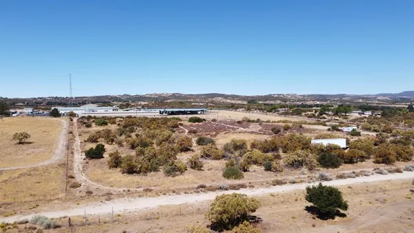 a view of beach and swimming pool