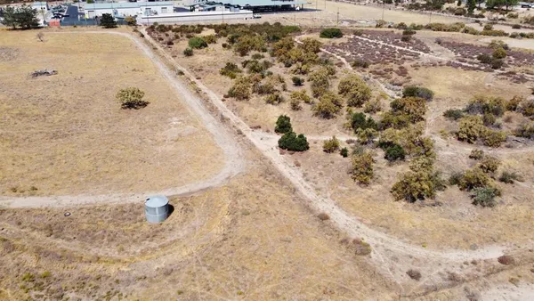 a view of a covered with snow on the road