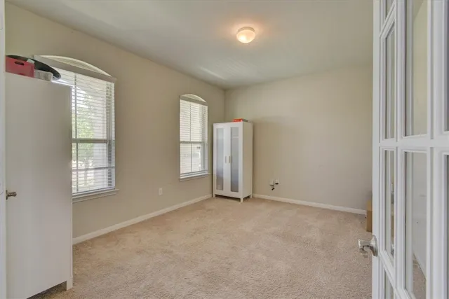 an empty room with windows