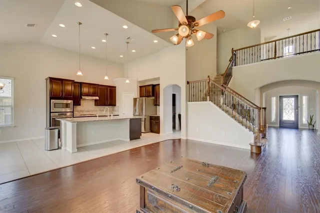 a view of kitchen with furniture and wooden floor