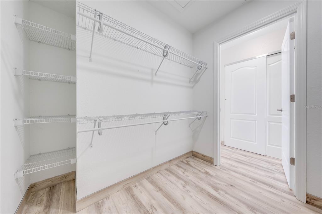 7465 Ebro Road Englewood, FL 34224 - Photo 46 of 92 walk in closet-primary