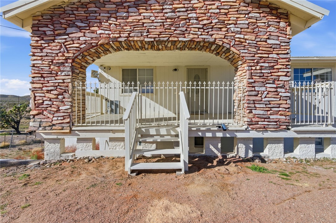 26151 Rainbow Road Meadview, AZ 86444 - Photo 3 of 46 New stairs leading to the deck that has also been refreshed