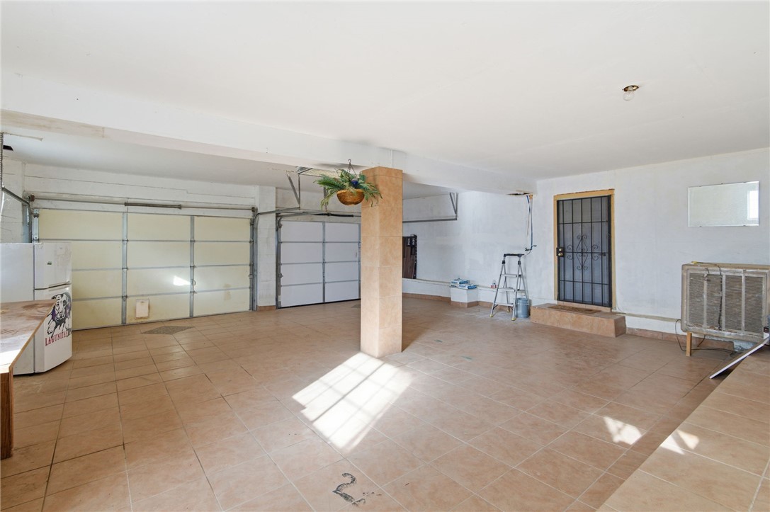 26151 Rainbow Road Meadview, AZ 86444 - Photo 33 of 46 Garage with extra refrigerator