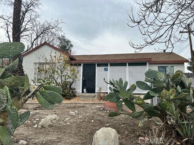 7025 Day Street Tujunga, CA 91042 - Photo 17 of 28 a view of a house with a tree in the background