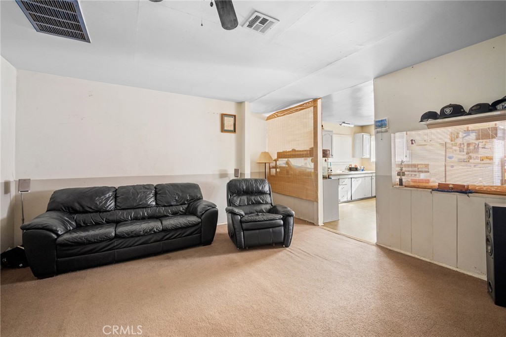 7025 Day Street Tujunga, CA 91042 - Photo 21 of 37 a living room with furniture and a kitchen