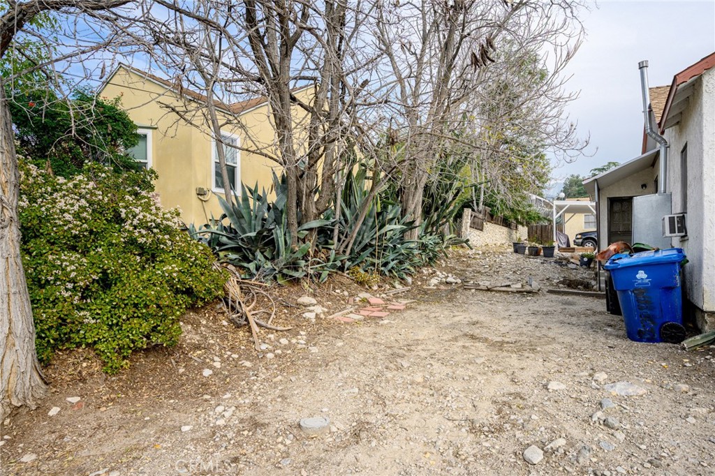 7025 Day Street Tujunga, CA 91042 - Photo 30 of 37 a view of a backyard with large trees
