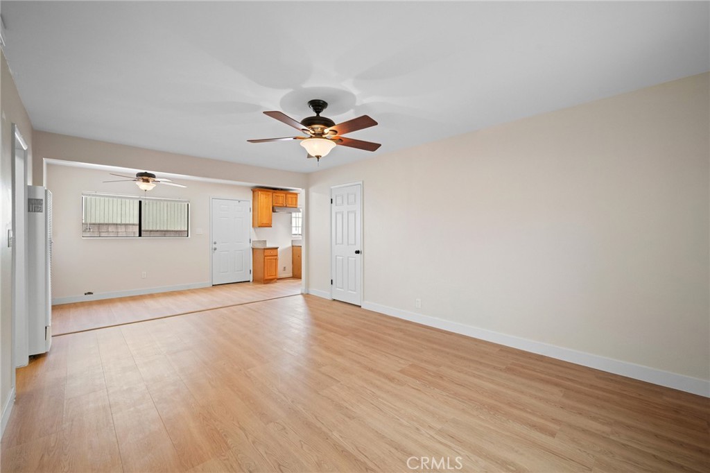 7025 Day Street Tujunga, CA 91042 - Photo 3 of 28 a view of an empty room with wooden floor