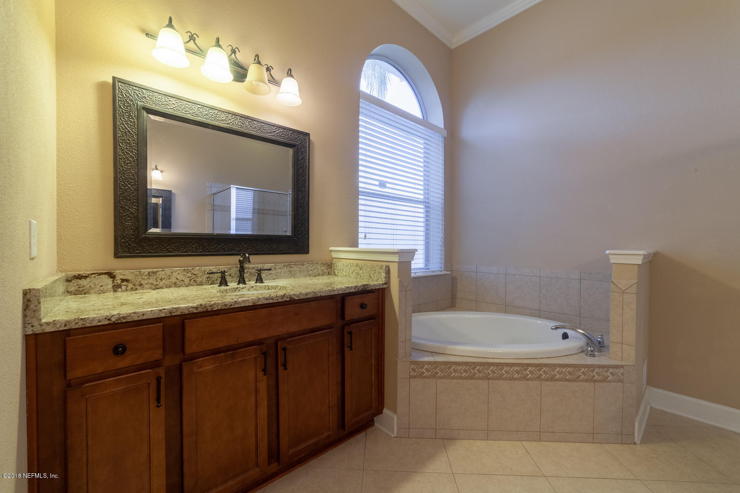 732 Castledale Court St. Johns, FL 32259 - Photo 13 of 51 a bathroom with a tub sink and mirror