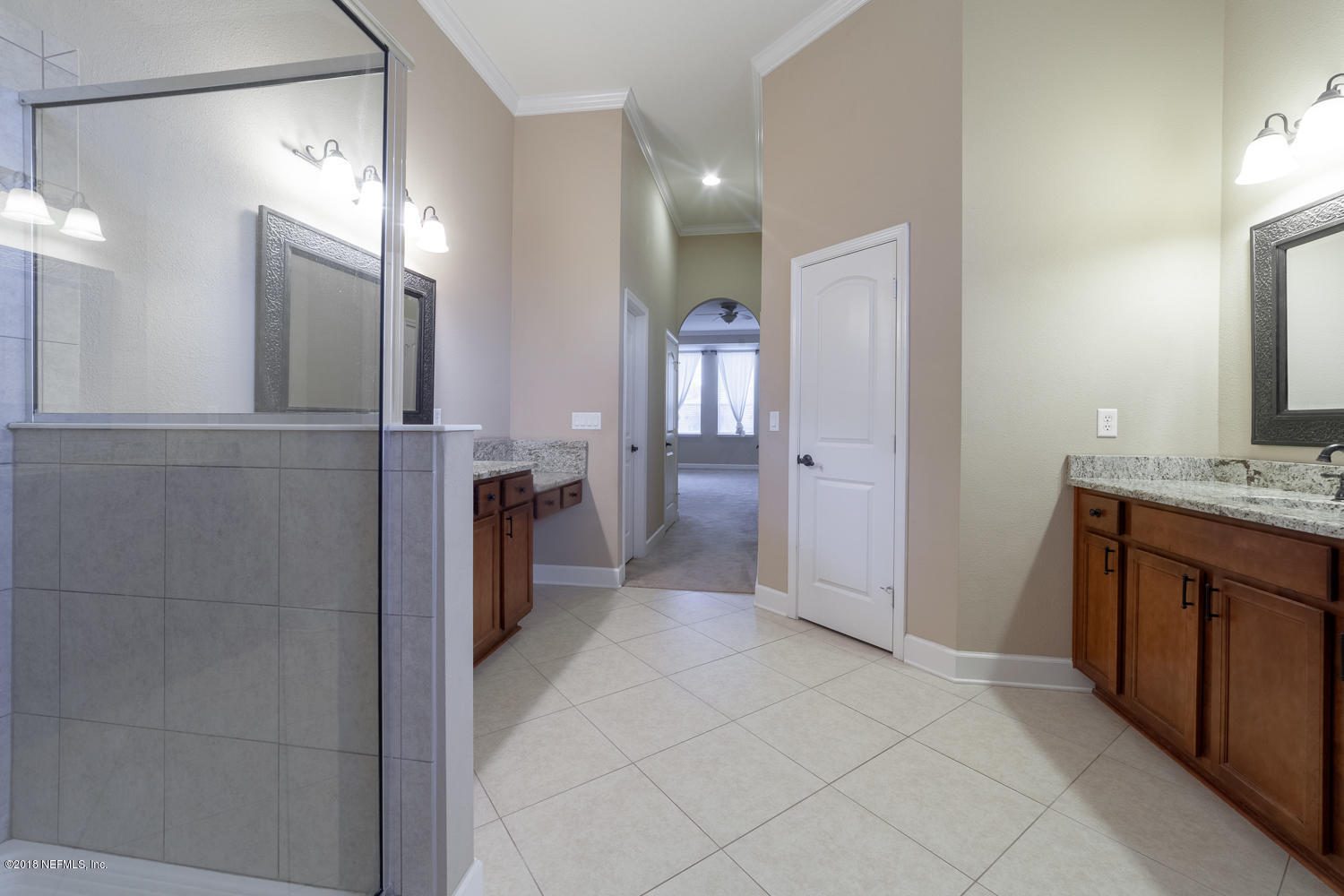732 Castledale Court St. Johns, FL 32259 - Photo 16 of 51 a bathroom with a double vanity sink and a mirror