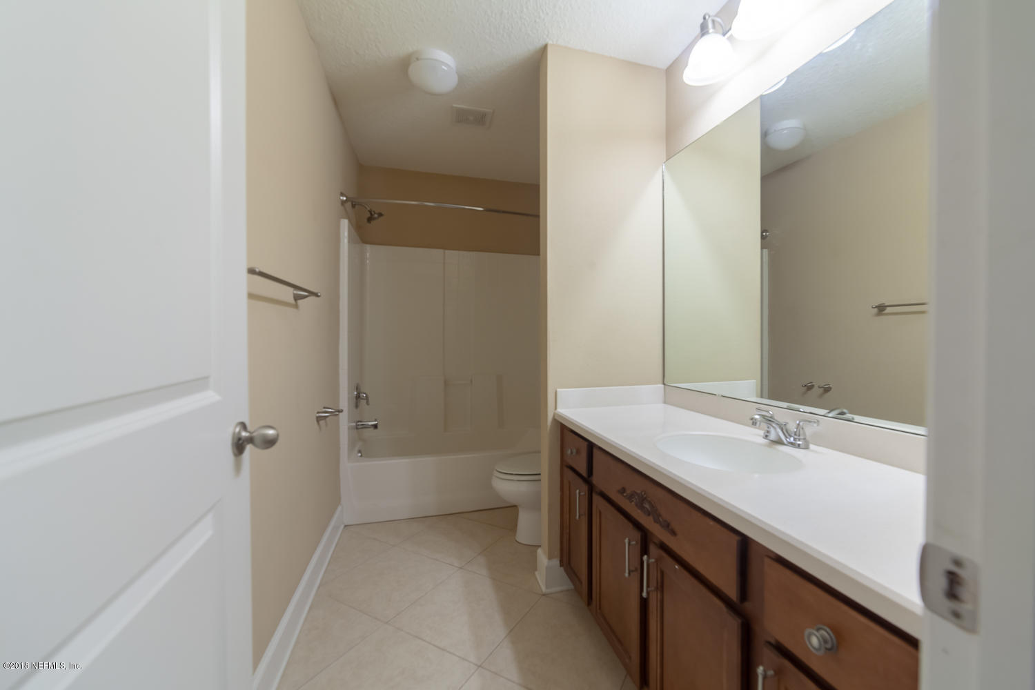 732 Castledale Court St. Johns, FL 32259 - Photo 31 of 51 a bathroom with a sink a mirror and a bathtub