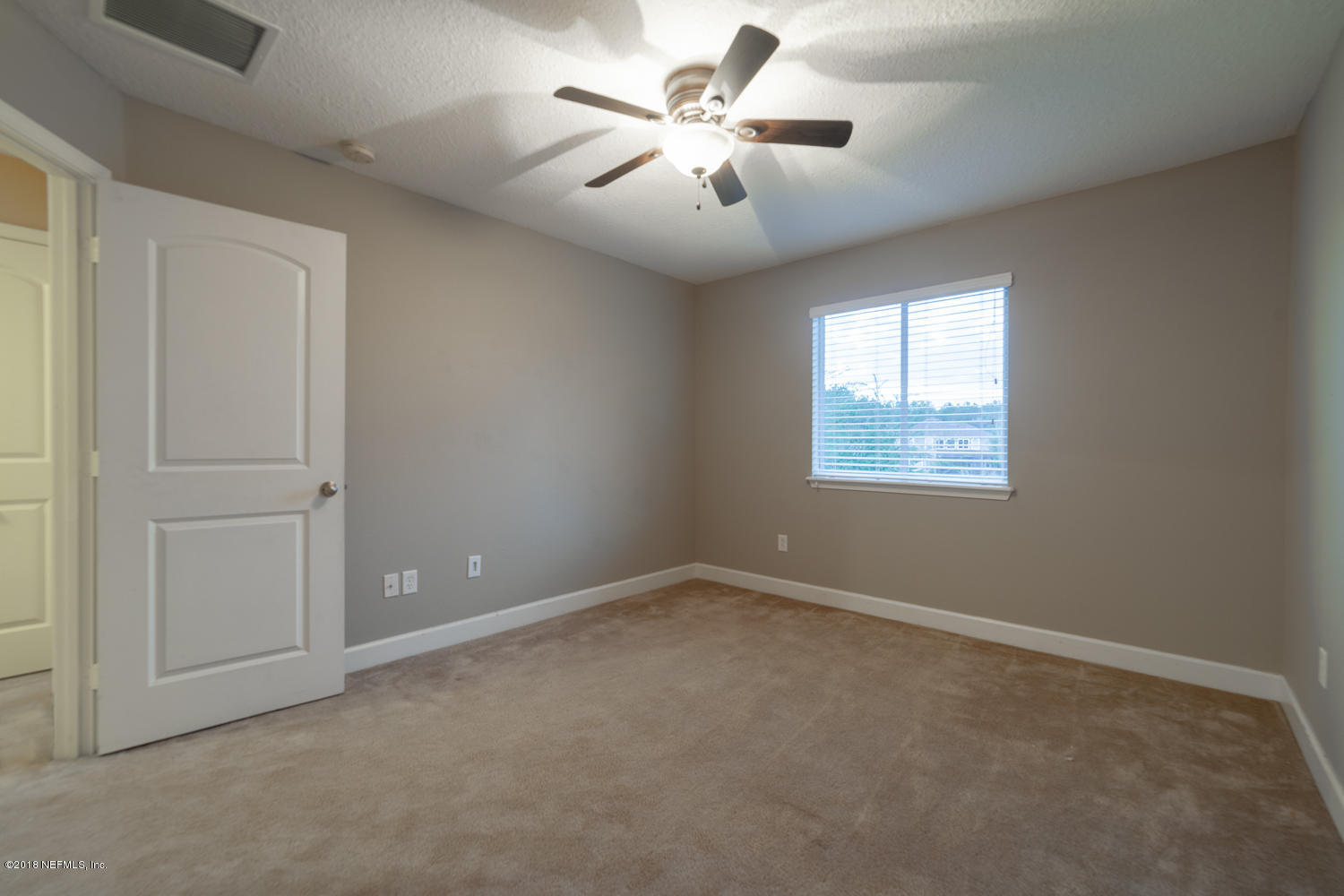 732 Castledale Court St. Johns, FL 32259 - Photo 38 of 51 an empty room with windows and fan