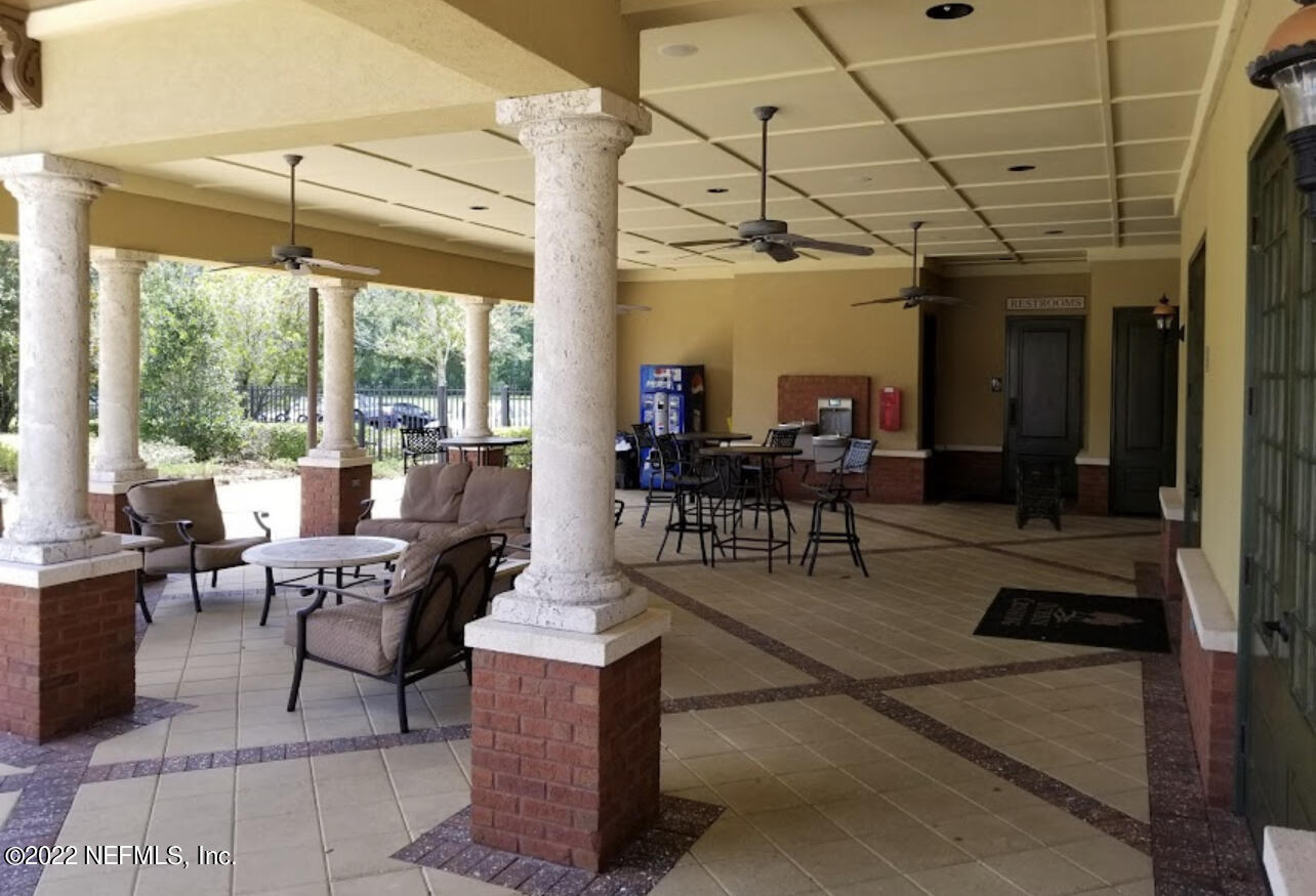 732 Castledale Court St. Johns, FL 32259 - Photo 48 of 51 a view of a patio with table and chairs